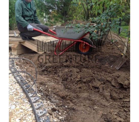 Устройство рулонного газона в коттеджном поселке - фото - 5